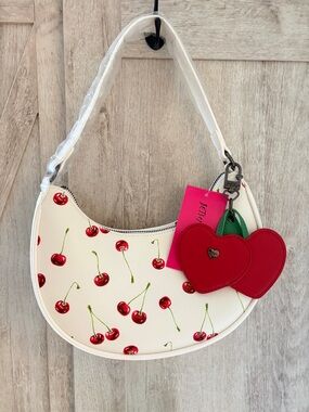Betsey Johnson White Cherry Print Crescent Shoulder Bag with Red Heart Charm